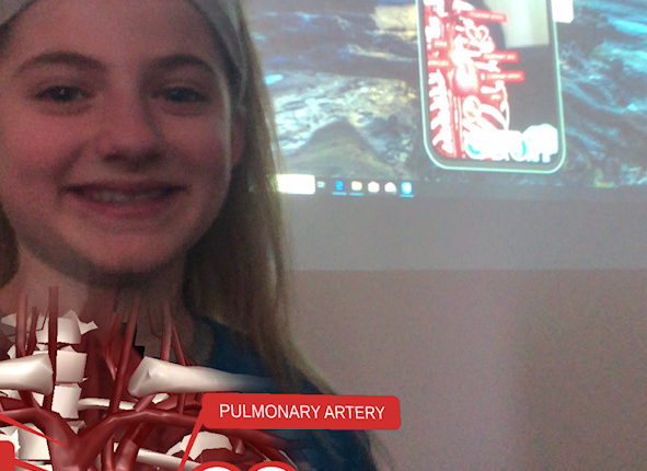 Elementary Students view inside the body with Augmented Reality